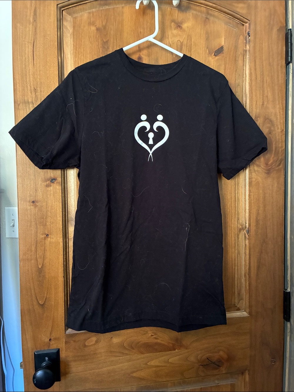 Black Short-Sleeve Tee with White Heart Keyhole Graphic
